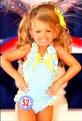 Child beauty pageant - Child in seductive clothing and posing as a hooker Child beauty pageant - Child in seductive clothing and posing as a hooker