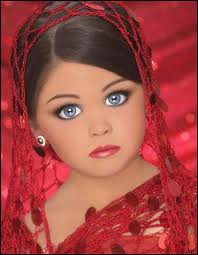 Child in beauty pageant - Another example of forced precociousness in children.