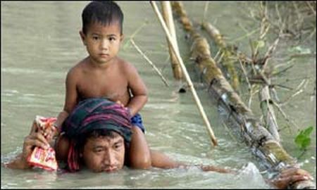 flood in my land - The dad is rescuing his son from flood