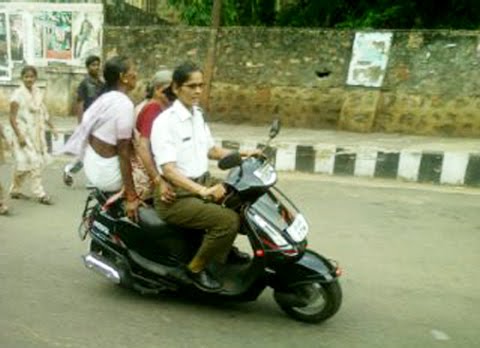 Triple seat on two wheeler - Triple seat