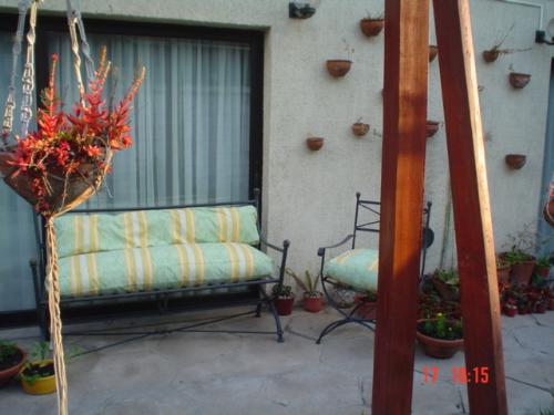 The big window, the terrace and the curtains - I am proud of my terrace as it´s all made by our hands, even the plant hanger.