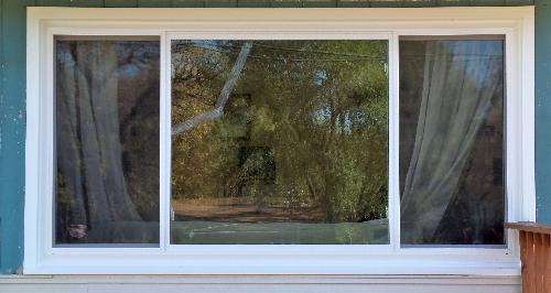 Living Room Window - Cracked outer glass Living Room Window - Cracked outer glass