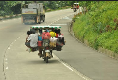 motorcycle - This photo was taken in Mindanao area, Agusan, Philippines. Amazingly the driver was able to balance everything. 