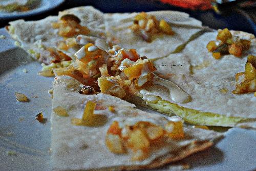 Quesadillas - This is a Quesadillas Veracruz from Mooon Cafe in Ormoc City, Leyte, Philippines. It has tomatoes, cheese and bits of ground pork.