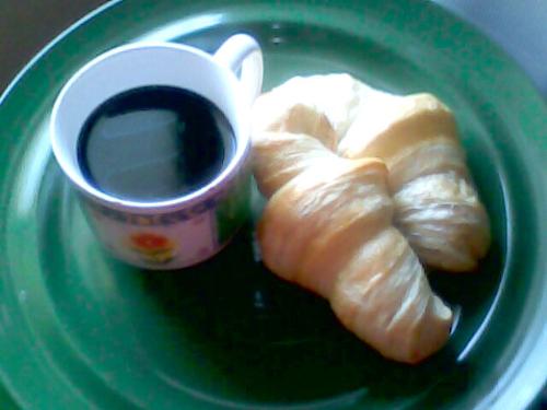 Croissant with coffee - anyone? Croissant with coffee - anyone?