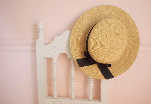 hat  - hat hanging on a chair