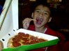 Pizza!! - Here's a picture of my son after his teeth were extracted. He didn't mind the pain, he actually ate the whole pizza by himself.