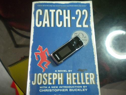 audiobook, book, e-book - Catch-22 and MP3 player