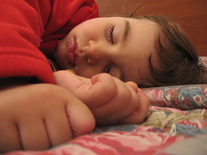child sleeping nice - child sleeps and dreaming something
