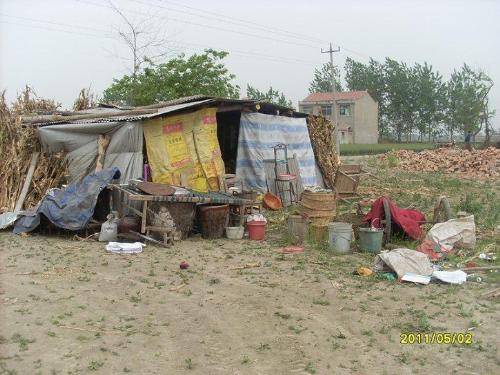 house - China some place,and people live this house, the Chinese are really poor.