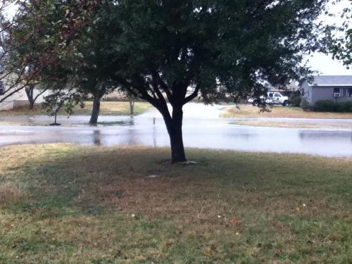 Flooded Road! - This is a picture of the road in front of my house after we got all the rain last night!
