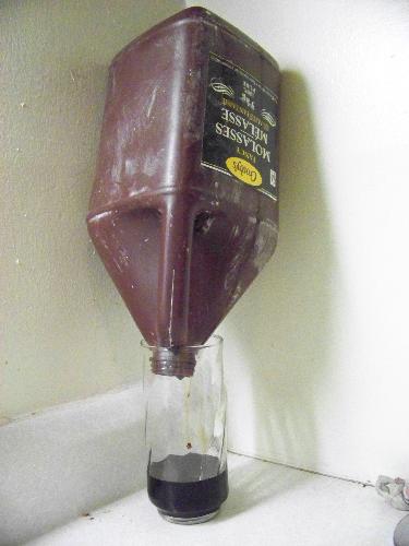 Frugal Upside Down Molasses - Just set the jug upside down on top of a drinking glass and you'll probably et about a half a cup of molasses :-) Frugal Upside Down Molasses - Just set the jug upside down on top of a drinking glass and you'll probably et about a half a cup of molasses :-)