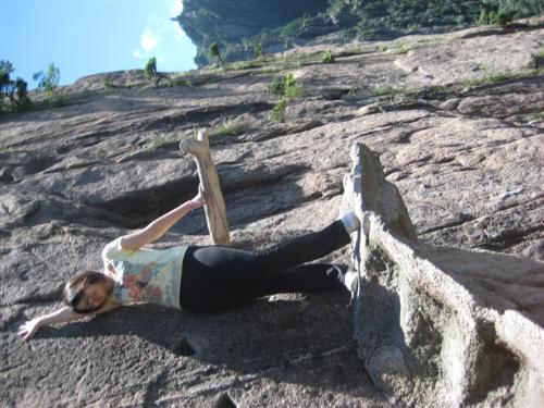 at the cliff of the mountain  - this is me climbing the most famous & beautiful mountain in china called 'huangshan' , it's at the cliff!!!
