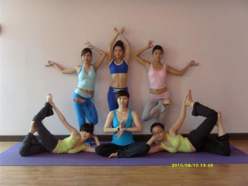 yoga enjoying - in the middle ,is our yoga coach.