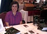 Book Signing Event - This is just one of my book signing events. Since the publishing of my first book 'Realmwalkers,' I have been busy traveling the local cities to promote and sell it. It took me and my co-author three years to write the story and for me to do all the artwork and formatting. I guess you can say it's our 'baby' as we cut out the bookcover artist, layout designer and marketing reps to get this book published.