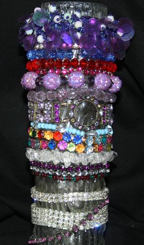 Bracelet Holder - My bracelet holder invention, a round vase, keeps bracelets together,