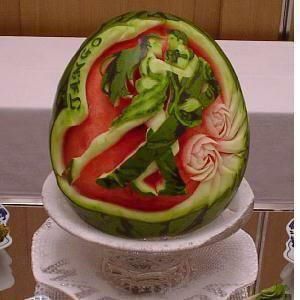 fruit carvings - watermelon carved like a pair danceing