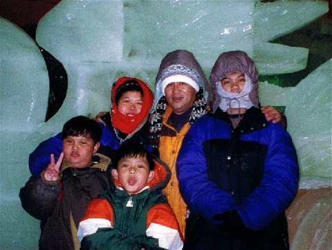 family picture - I am the one wearing green. Picture taken year 1998. still 9 years old at that time