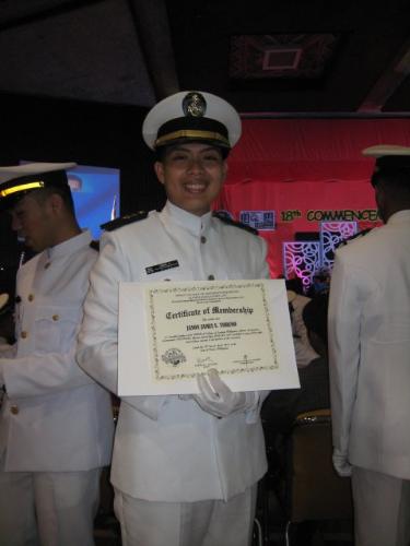 graduation. - during graduation, showing off diploma