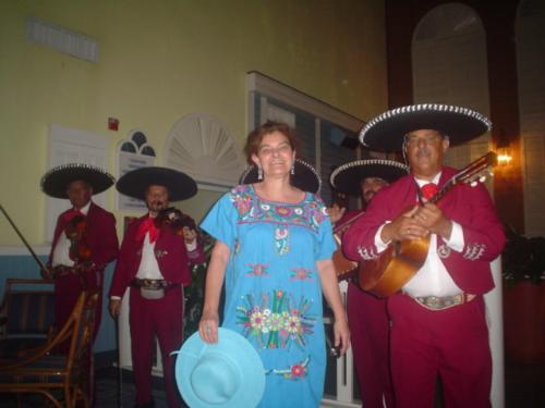 Mariachis and mexican dress - A friend of mine took this picture of me while singing rancheras with the mariachis.