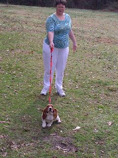 Kimmie and Rosie in the yard - This is a photo of my daughter and her dog, Rosie.