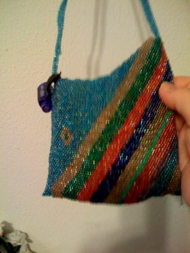 My beaded cell phone pouch - the strap is what I'm totally rebeading