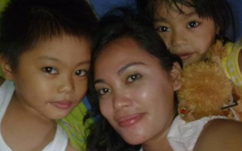 me and my 2 precious kids - This photo is taken at home when nothing to do.My son loves to play my phone by taking pictures when we are at bed.He will hug me and my daughter too run after me,they jealous each other with my attention,so what I did i hug them both and we take picture.I lov e this picture a lot.