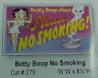 No Smoking - Shows dancing Betty Book beside No Smoking sign.