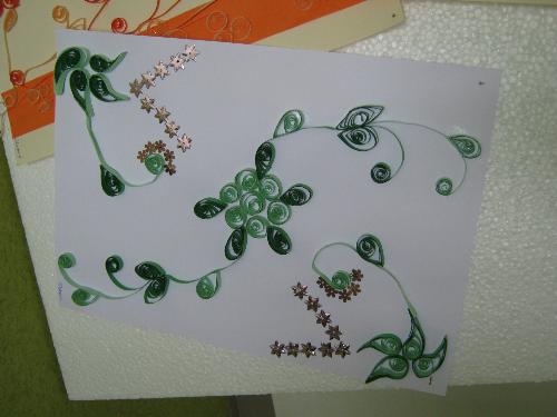 green - Another paper quilling technique. Only two colors are used well harmonized green- black and green. The cut stars complete the beauty.