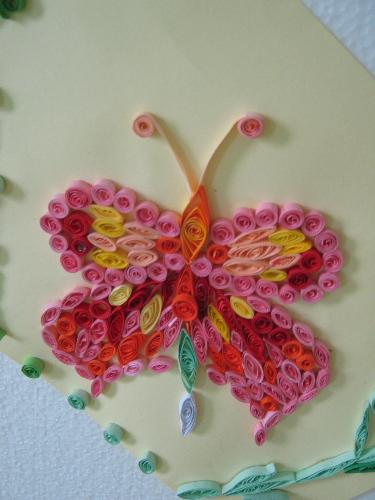butterfly - a painstaking work that has udes many quilling round and flattened forms. Colors are well harmonized and give the impression of real. Impressive throughness with which they werw made