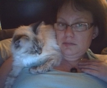 Moi and my Kitten Ella Bella - My kitten had decided to make herself comfy lol