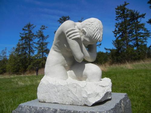 male white sculpture...depressed. - this is a male white sculpture who appears to be depressed.