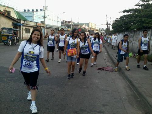 at the 5k Philhealth run - that is me..5224 this was on our way back...lol stopped for a pic. 