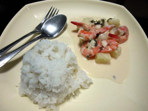 Food - Rice and Shrimp dish cooked with pineapple bits and coconut extracts.