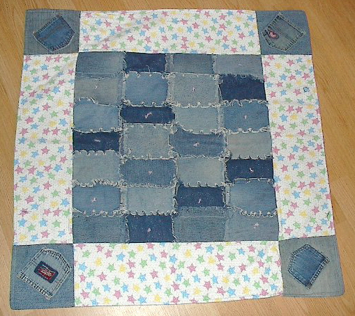 Denim Dreams quilt - A denim and flannel baby quilt I made using my children's outgrown denim and flannel baby blankets.