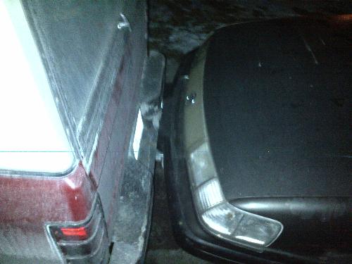 Kissing bumper - This shows exactly how close he parked.