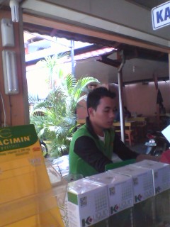 cashier - he workr from morning till late at night.
