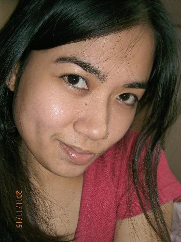 this is me - I took thios picture the first time a bought my digicam. Not so nice cam but good thing I' photogenic though..lol.smiley!!=)