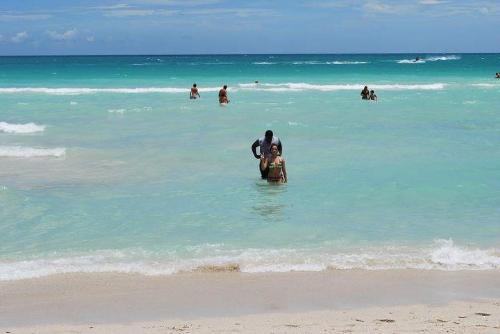 white sand beach - It's enjoyable to spend a day or two at the beach.