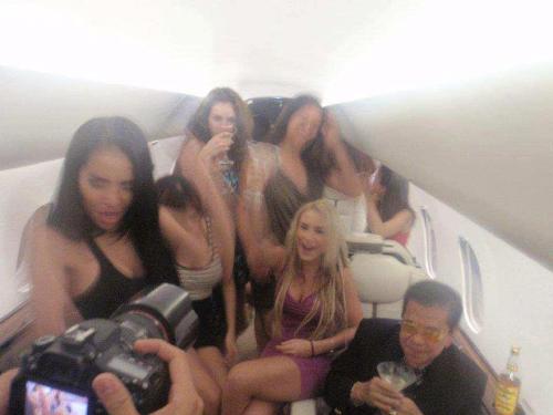 Congressman Party Animal - This is a verified copy of Gov. Chavit Singson posing along with Brazillian models inside his private jet-plane. He claims this is genuine and the photo shoot was meant for an advertisement of an alcoholic drink. Right.
