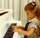 piano - the child is playing the piano