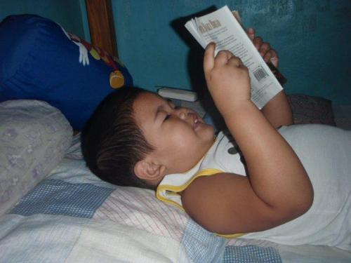 Studious child - Is he really reading?