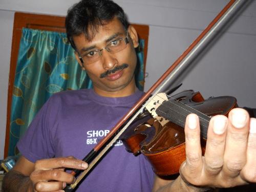 me with my violin - Just trying to play my new violin.