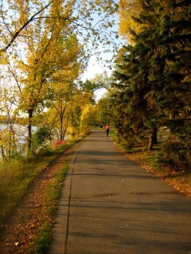 The Lake I walk around - This is a picture of the path on Lake Calhoun, a big lake in my city, during the fall. It's so pretty! And there are always tons of people walking around it, running around it, rollerblading, biking, walking their pets, grilling, playing volleyball, swimming, etc.