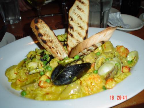 Nicely arranged paella - Even some bread can add a zest to a dish if you toast it.