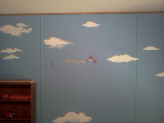 Hubby painted this for our sons room - My son loves airplanes so my husband painted this on his wall. Its not finished yet though...
