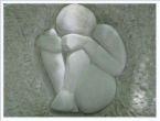 Shame - Shows a stuatue of a man with his head bowed