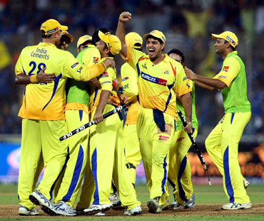 csk victory against rcb - CSK celebrating their victory against RCB in a nail bitting match.