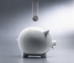 saving money - putting it to the piggy wiggy bank