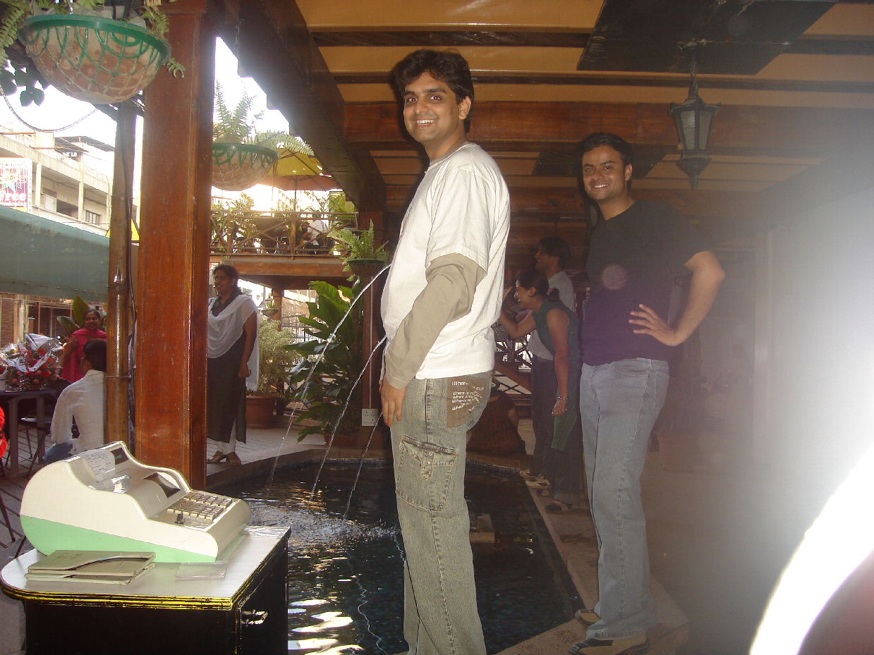 Trick - Another trick photography. Taken in Bangalore - Also seen in the pics are my friends